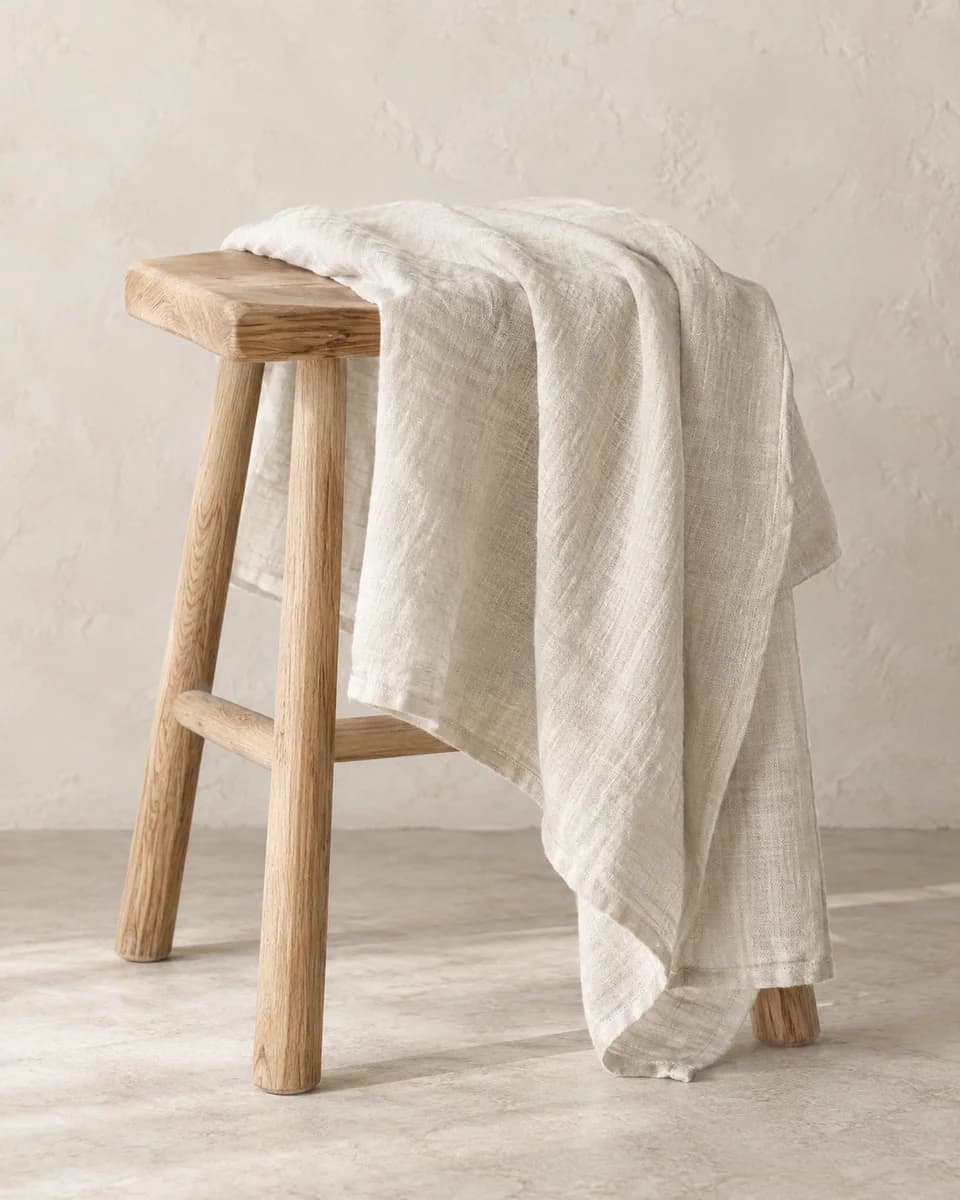 The texture and drape of the linen towel