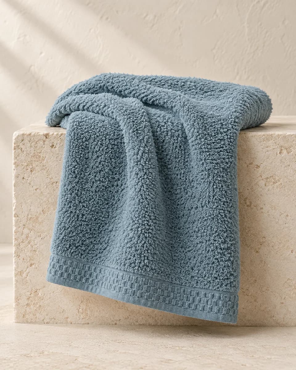 The texture and drape of the shower towel
